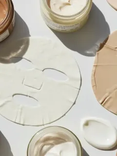Collection of various face masks on white surface