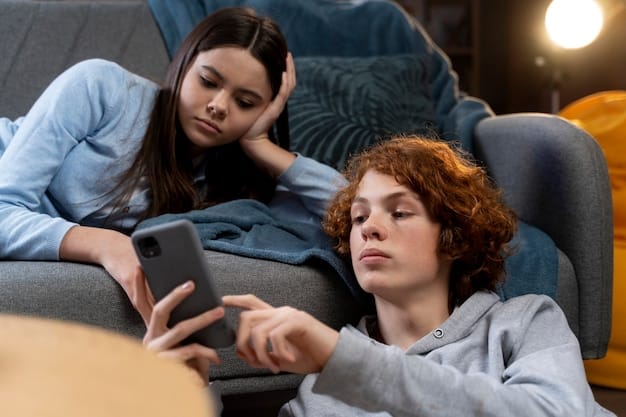 A therapist talking to a worried teenager, with a smartphone lying face down on the table. The scene symbolizes the emotional impact of harmful viral challenges and the need for mental health support.