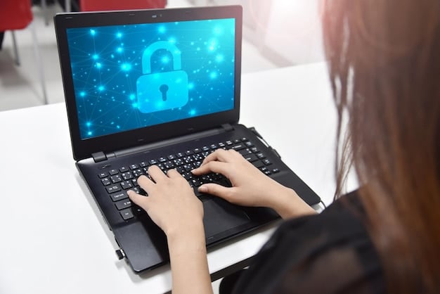 A person using a laptop with a padlock icon displayed prominently on the screen. The background is blurred to focus on the laptop and the security symbol, conveying a sense of digital security.