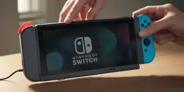 Nintendo Switch with faint screen glow, hands attempting to power on