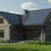 Modern home with solar panels and energy-efficient systems qualifying for tax credits